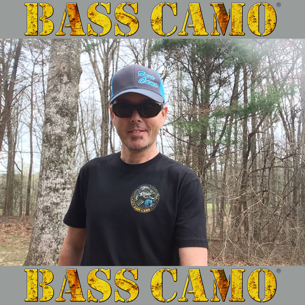 Bass Camo 3D Script Fishing Hat Snap Back Trucker embroidered in pro-stitch high thread count neon blue or pink with risen 3D script superior feature.
