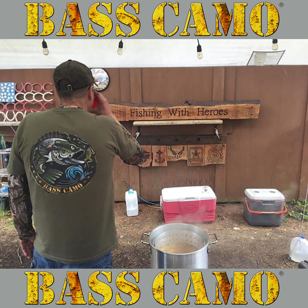 Bass Camo "The Vet" Fishing Shirt performance short sleeve t-shirt features front and back vibrant design 4.3 oz 100% ring spun cotton for superior softness with set-in baby rib collar and tear away label.