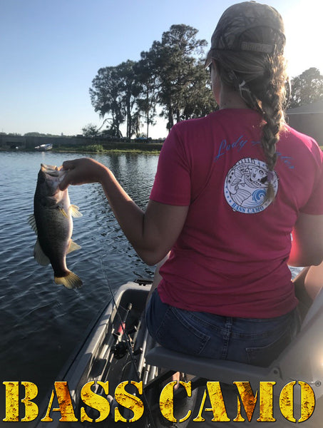 ON SALE Bass Camo "Lady Angler" Fishing Shirt Dry Fit V-Neck Sport Competitor Tee features front and back vibrant design lightweight 3.8 oz 100% polyester interlock highly breathable moisture wicking gently contoured silhouette and tear away label.